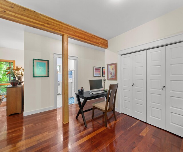 928 Curtis Rd, Quincy, MI 49082 - office area with dark wood-style floors and beamed ceiling