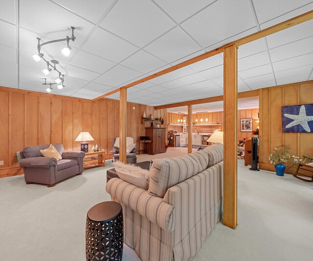 928 Curtis Rd, Quincy, MI 49082 - carpeted living area featuring wooden walls