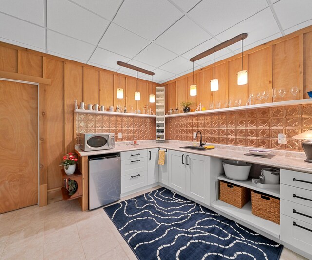 928 Curtis Rd, Quincy, MI 49082 - kitchen featuring white microwave, open shelves, fridge, light countertops, and backsplash
