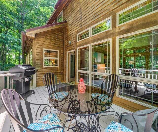 928 Curtis Rd, Quincy, MI 49082 - wooden deck featuring a grill