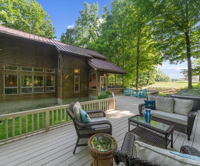 928 Curtis Rd, Quincy, MI 49082 - wooden deck with an outdoor living space