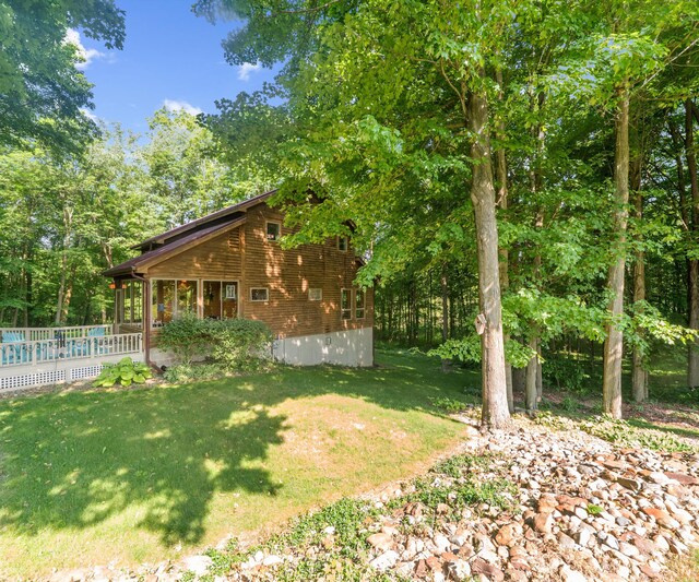 928 Curtis Rd, Quincy, MI 49082 - view of grassy yard featuring a wooden deck
