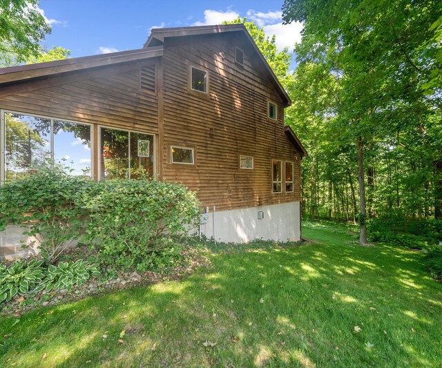 928 Curtis Rd, Quincy, MI 49082 - view of property exterior with a lawn and crawl space