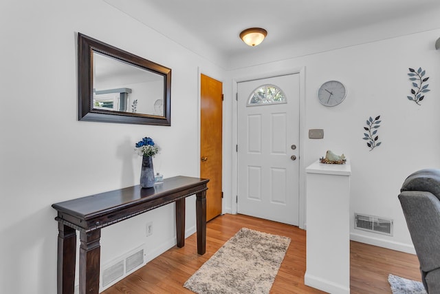 2606 S Saint Anthony St, Jackson, MI 49203 - entryway featuring wood finished floors and baseboards