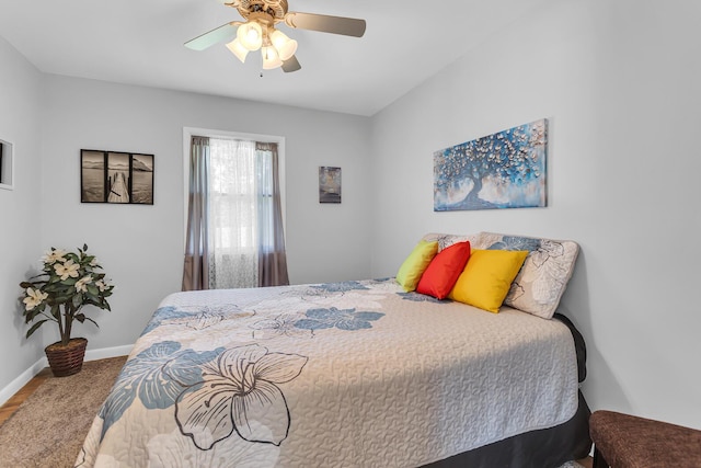 2606 S Saint Anthony St, Jackson, MI 49203 - bedroom featuring baseboards and ceiling fan