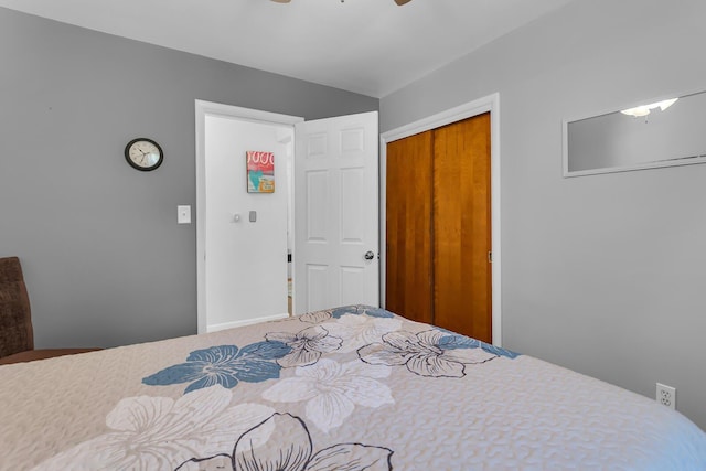 2606 S Saint Anthony St, Jackson, MI 49203 - bedroom with a ceiling fan and a closet