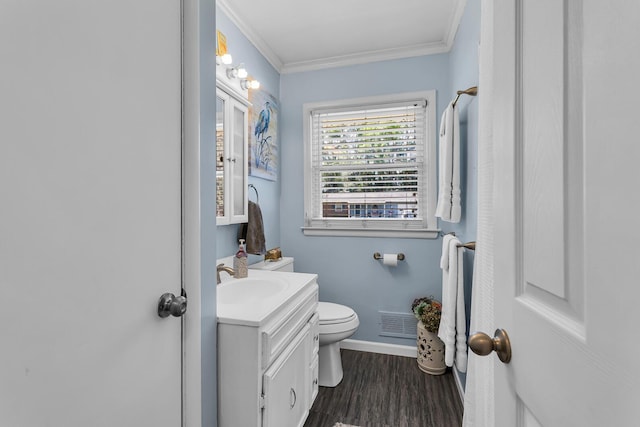 2606 S Saint Anthony St, Jackson, MI 49203 - bathroom featuring vanity, wood finished floors, and crown molding