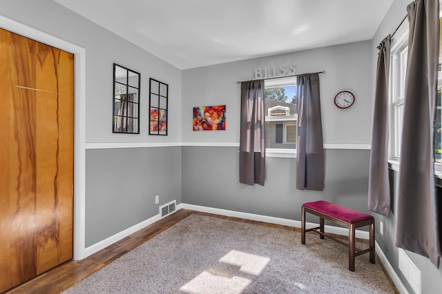 2606 S Saint Anthony St, Jackson, MI 49203 - living area with wood finished floors and baseboards