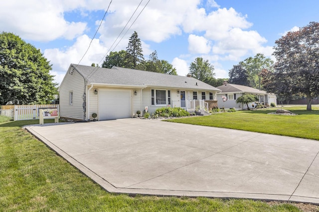 2606 S Saint Anthony St, Jackson, MI 49203 - ranch-style home with a garage and driveway
