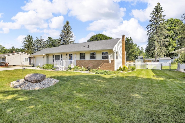 2606 S Saint Anthony St, Jackson, MI 49203 - single story home featuring a chimney, brick siding, an attached garage, and a gate