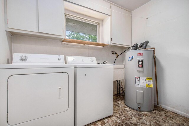 1205 Sassafras Ln, Niles, MI 49120 - laundry room featuring electric water heater, cabinet space, and washer and dryer