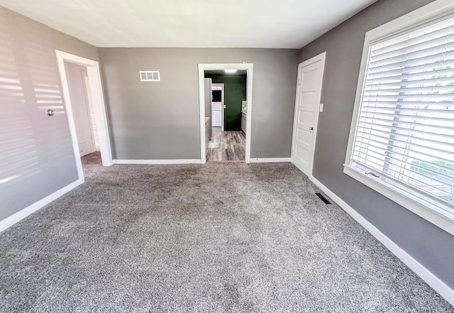 148 N Eddy St, Merrill, MI 48637 - unfurnished bedroom featuring carpet