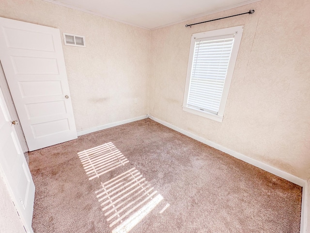 148 N Eddy St, Merrill, MI 48637 - empty room with crown molding and carpet floors