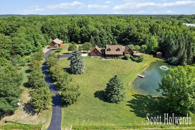 6311 142nd Ave, Holland, MI 49423 - aerial view of property and surrounding area with a heavily wooded area and a nearby body of water