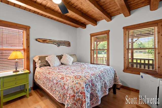 6311 142nd Ave, Holland, MI 49423 - bedroom featuring a wood ceiling with exposed beams, light wood-style flooring, and ceiling fan