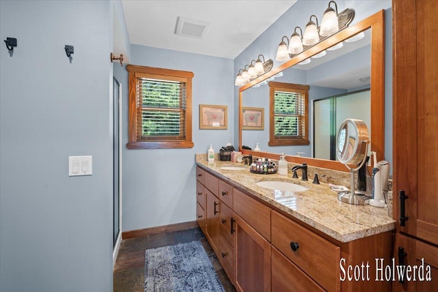 6311 142nd Ave, Holland, MI 49423 - bathroom with double vanity and an enclosed shower
