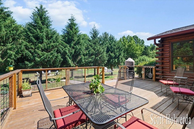 6311 142nd Ave, Holland, MI 49423 - wooden deck featuring outdoor dining area