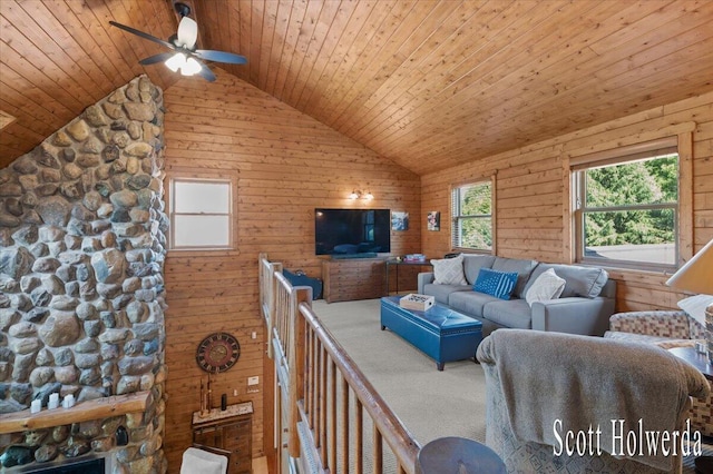 6311 142nd Ave, Holland, MI 49423 - living room with wood ceiling, lofted ceiling, ceiling fan, and wooden walls