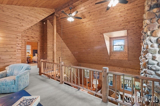 6311 142nd Ave, Holland, MI 49423 - living area featuring a ceiling fan, high vaulted ceiling, wood ceiling, carpet flooring, and wooden walls
