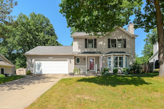 7154 Sandpiper St, Portage, MI 49024 - traditional home featuring a garage, driveway, a storage shed, covered porch, and a chimney
