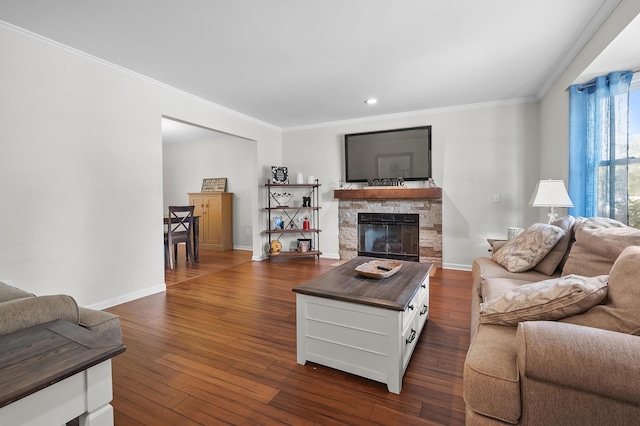 7154 Sandpiper St, Portage, MI 49024 - living room with crown molding, dark wood-style flooring, a fireplace, and recessed lighting