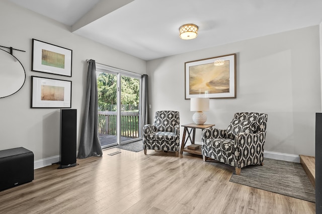 7154 Sandpiper St, Portage, MI 49024 - living area featuring baseboards and wood finished floors