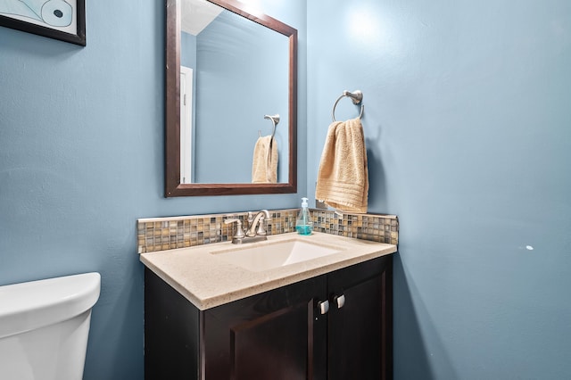 7154 Sandpiper St, Portage, MI 49024 - bathroom with vanity and decorative backsplash