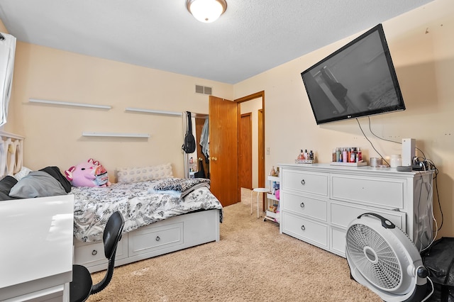 7154 Sandpiper St, Portage, MI 49024 - bedroom featuring light colored carpet and a textured ceiling