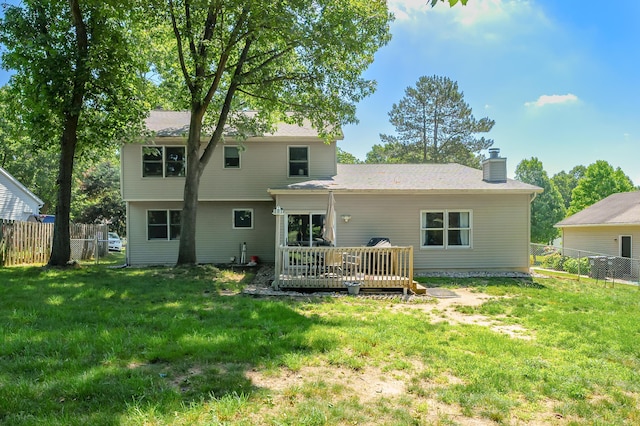 7154 Sandpiper St, Portage, MI 49024 - back of house featuring a chimney and a deck