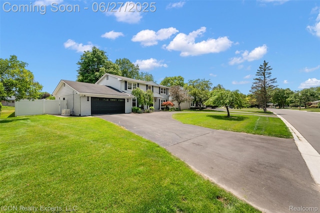 28440 Brooks Ln, Southfield, MI 48034 - traditional-style home with a garage and asphalt driveway