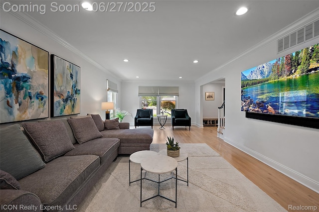 28440 Brooks Ln, Southfield, MI 48034 - living room featuring light wood-type flooring, recessed lighting, and ornamental molding