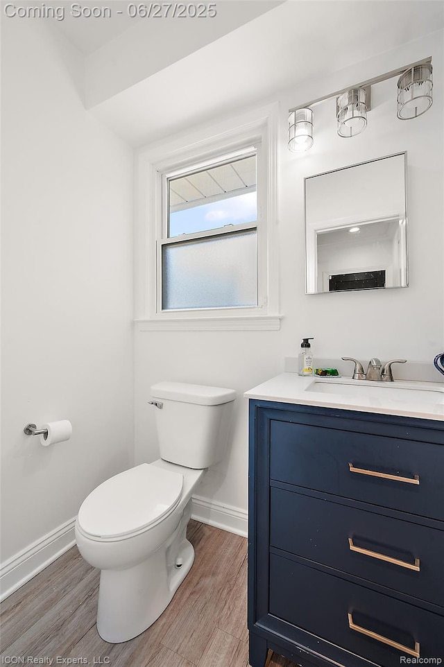 28440 Brooks Ln, Southfield, MI 48034 - half bath featuring vanity and wood finished floors
