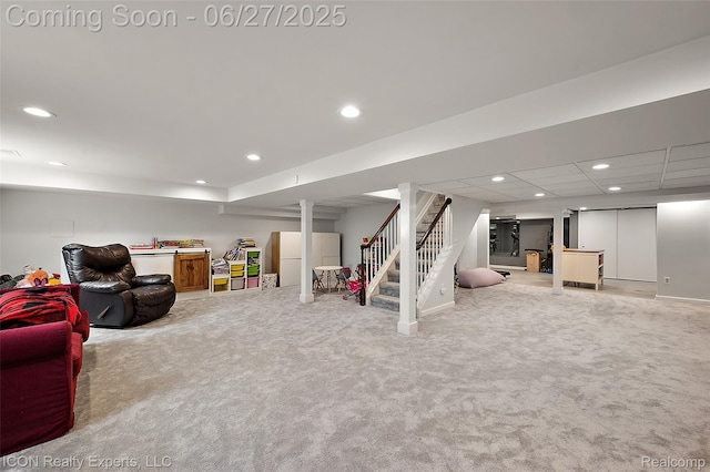 28440 Brooks Ln, Southfield, MI 48034 - finished basement with white refrigerator, stairway, recessed lighting, and carpet floors
