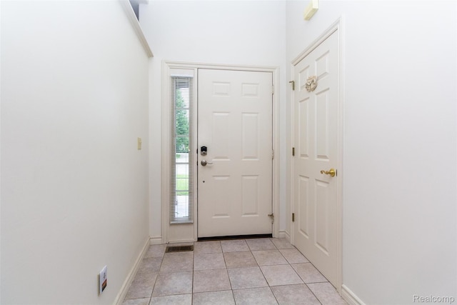 10267 Coachman Ct, Davison, MI 48423 - entrance foyer with light tile patterned floors and baseboards
