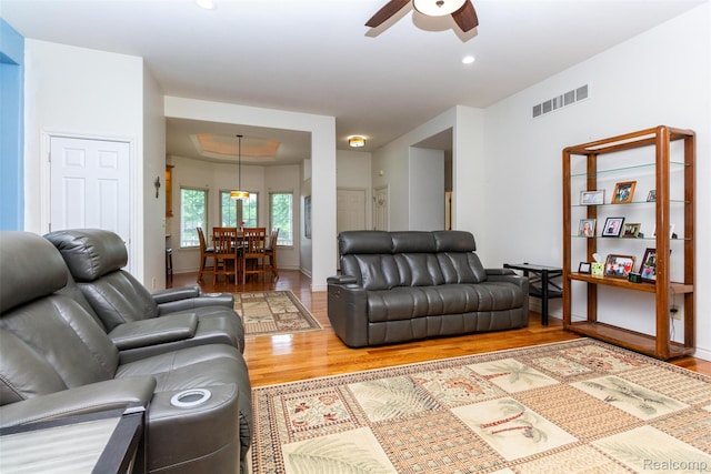 10267 Coachman Ct, Davison, MI 48423 - living room with wood finished floors, a ceiling fan, and recessed lighting