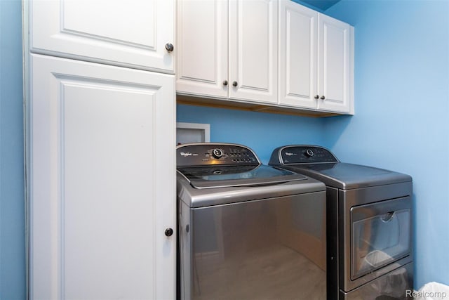 10267 Coachman Ct, Davison, MI 48423 - laundry room with cabinet space and independent washer and dryer