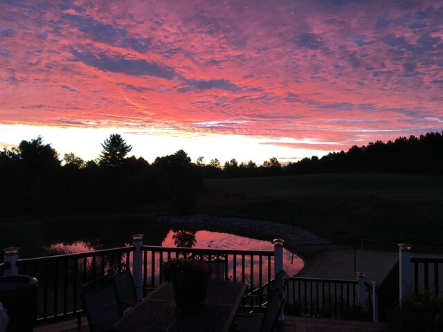 4255 S Eberhart Ave, Clare, MI 48617 - view of deck at dusk