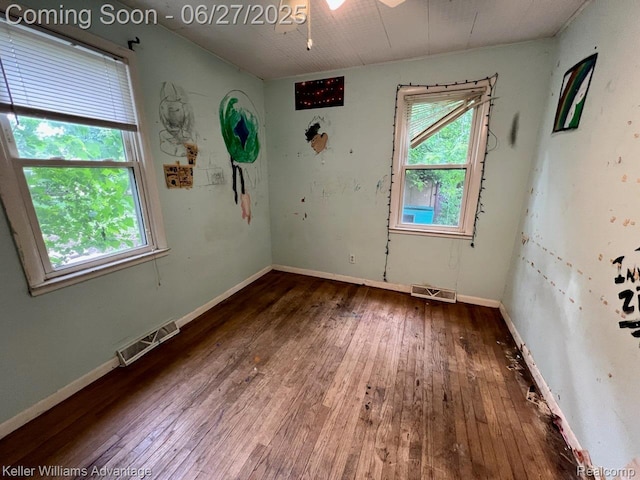 12 Hazel Ave, Pontiac, MI 48341 - empty room with wood-type flooring and a ceiling fan
