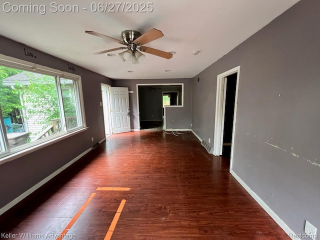 12 Hazel Ave, Pontiac, MI 48341 - empty room with healthy amount of natural light, wood finished floors, and ceiling fan