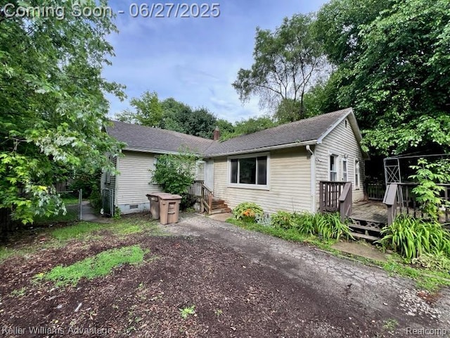 12 Hazel Ave, Pontiac, MI 48341 - view of front of home featuring a deck and a chimney
