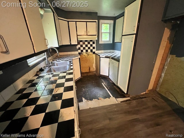 12 Hazel Ave, Pontiac, MI 48341 - kitchen with white cabinetry, under cabinet range hood, and tile counters