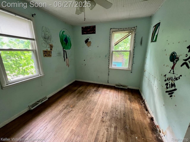12 Hazel Ave, Pontiac, MI 48341 - empty room with a ceiling fan and hardwood / wood-style flooring
