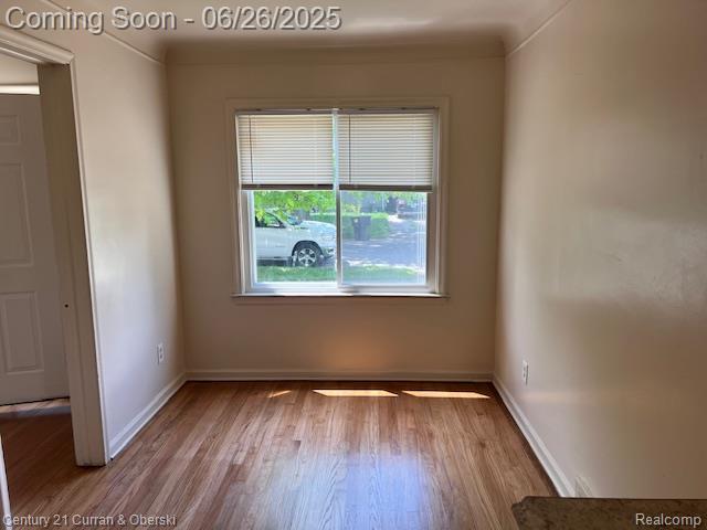 7548 Rockdale, Redford, MI 48239 - empty room with wood finished floors and baseboards
