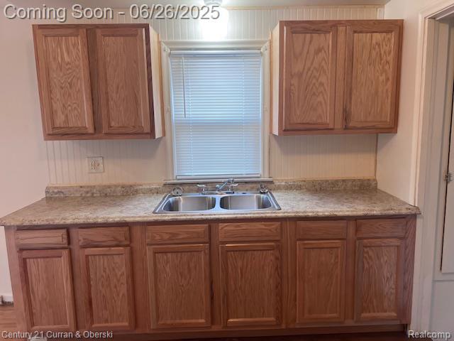 7548 Rockdale, Redford, MI 48239 - kitchen with light countertops and brown cabinetry