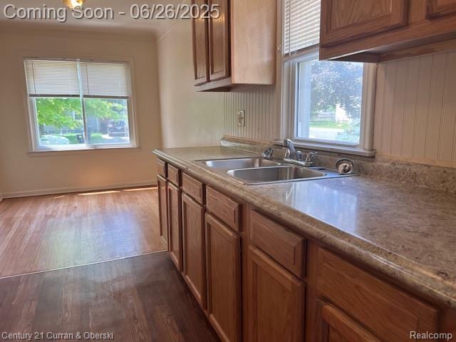 7548 Rockdale, Redford, MI 48239 - kitchen with dark wood-style flooring and brown cabinets
