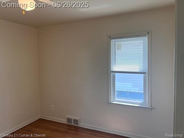 7548 Rockdale, Redford, MI 48239 - unfurnished room featuring dark wood-style flooring and baseboards