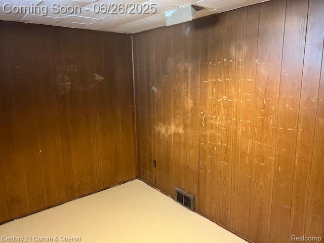 7548 Rockdale, Redford, MI 48239 - empty room with wooden walls
