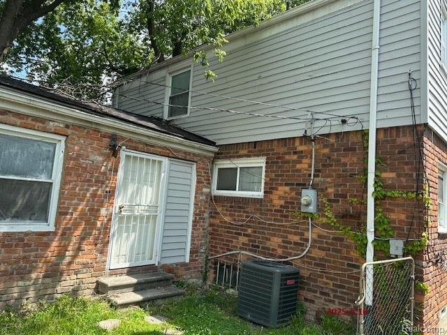 17233 Annchester Rd, Detroit, MI 48219 - rear view of property with brick siding and entry steps