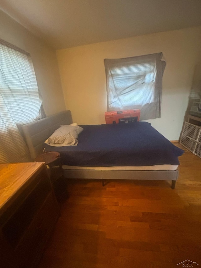 2220 Alice St, Farwell, MI 48622 - bedroom with wood finished floors