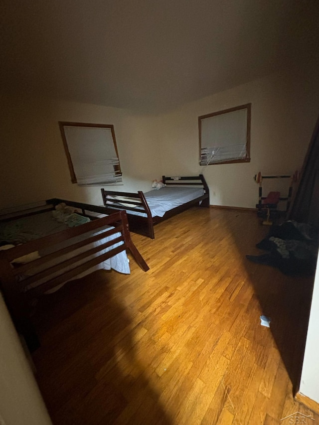 2220 Alice St, Farwell, MI 48622 - bedroom featuring light wood-style floors